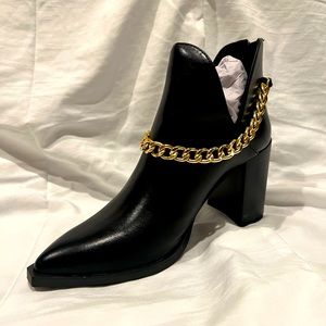 Gold chained black booties